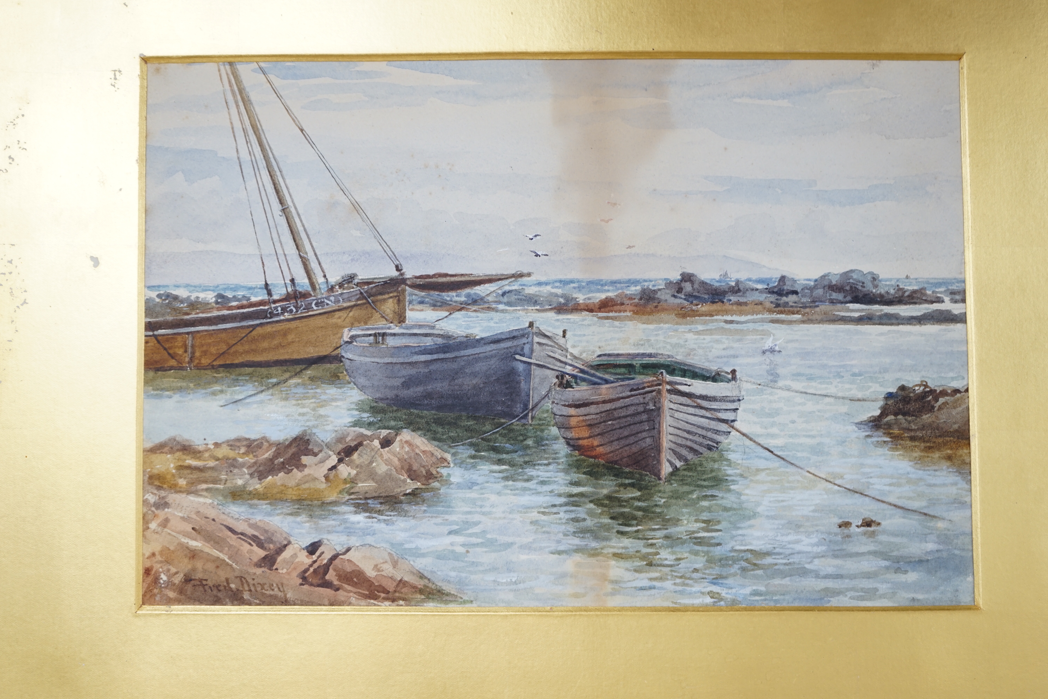 Frederick Charles Dixey (British, fl.1877-1920), watercolour, Fishing boats in harbour, signed, 24 x 36cm, unframed (a.f.)